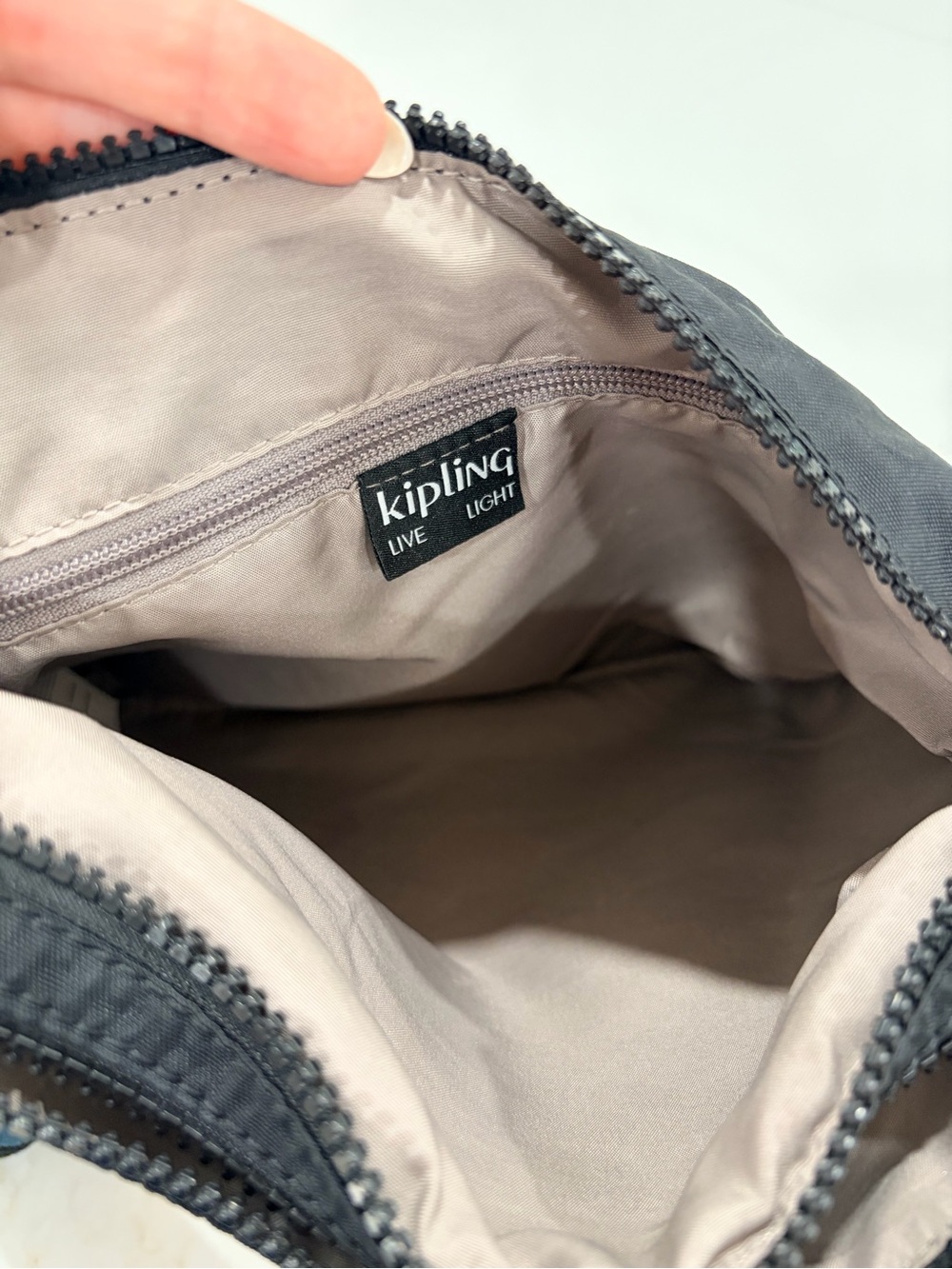 Kipling Black Compact Crossbody Bag with adjustable strap and 5 zipper pockets - Picture 3 of 8